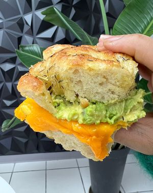 🔥 Vegan Breakfast Sammie at Val’s!🔥 Avo, Just Egg and cheddar on focaccia. AMAZING!!   at Val's Bakery in Dayton