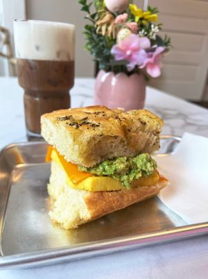 Vegan Breakfast Sammie! Just Egg, avocado and vegan chz on house focaccia 🤌🏼  at Val's Bakery in Dayton