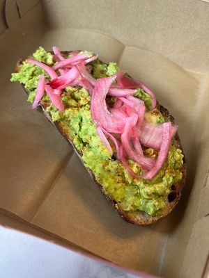 ‘That Good Good Toast’ 😍 - smashed avo on local sourdough, topped with pickled red onion, cayenne, evoo drizzle. Yum!   at Val's Bakery in Dayton