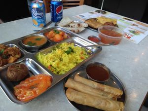 They have different 'thalis'. They have a separate counter for this on the right. You select what you want. They dish it out in front of you then go away and heat it up. Spicy. at RK Dining in Preston