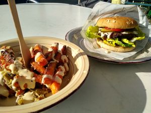 Burger with loaded cheesy sweet potato fries at Lupikuss in Wiesloch