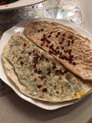 Qutabi with spinach and the other one with pumpkin  at Art Club in Baku