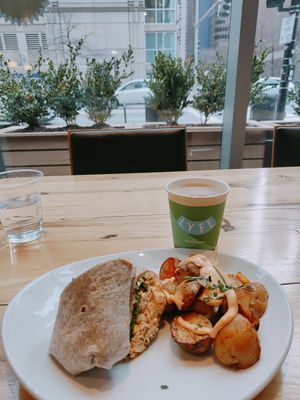 Vegan breakfast burrito and cinnamon oat latte. 👌 at LYFE Kitchen in Chicago