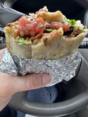 Vegan breakfast burrito (half eaten)  at The Sisters Restaurant in Everett