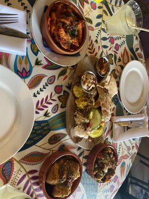 Sharing mezze platter and 3 of the small plates  at Otto Vegan Empire in Stockport