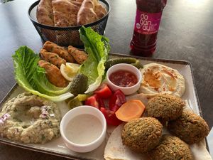 Paşa Plate
- Baba Ghanouj, Hummus, Falafel, Mercimek Köftesi, Pickles, Tahini sauce, Pide, and a small house salad at Nohut Paşa Cafe in Antalya