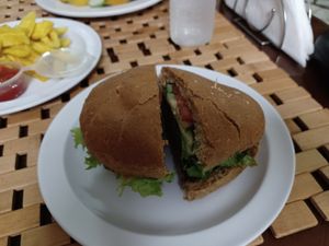 Chickpea Burgers  and sweet potatoe fries, and Split Pea Stew at Calabash Ital Restaurant in Ocho Rios