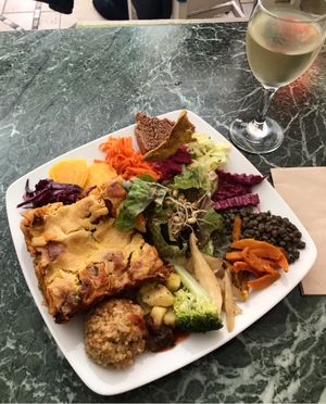 Vegan lasagna and white wine at Cafe Ginger in Paris