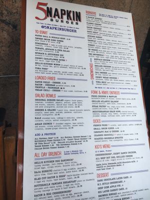 Menu in front: note that "V" stands for "vegetarian," not vegan. at 5 Napkin Burger in New York City