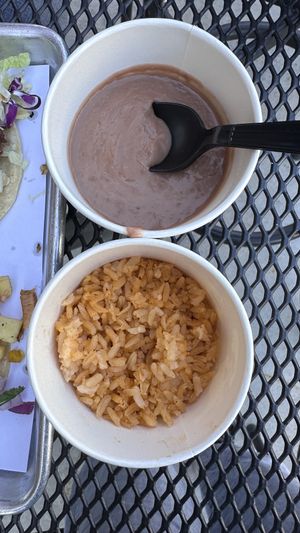 Sides of beans and rice(tiny portions)  at Vatos Tacos + Tequila at The Foundry in Loveland