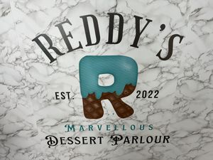 Logo  at Reddy's Marvellous Dessert Parlour in Aberdeen