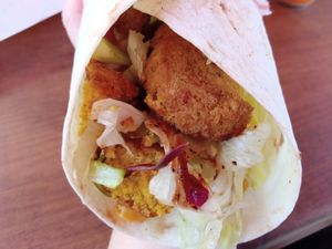 falafel wrap with salad and spicy sauce at Komagene - Köln Mülheim in Cologne