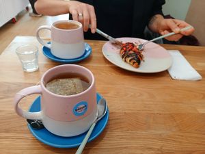 Coffee with Oatmilk and Camomile Tea at The Queer Emporium in Cardiff