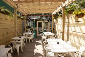 New fully-covered and dog-friendly courtyard, complete with space heaters and fans for those out of control weather days. at Undergrowth Coffee in New Orleans