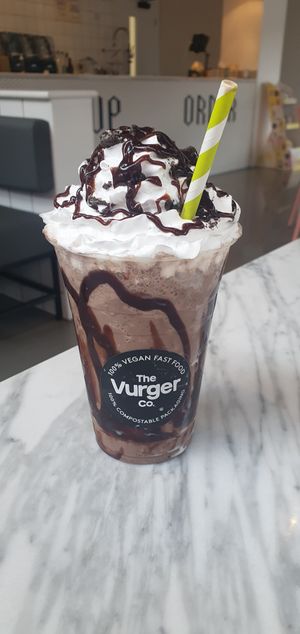 Double Chocolate Brownie
Shake: Creamy chocolate shake base with fudgy chocolate brownie and chocolate cookie syrup. Added whipped cream topped with brownie pieces. at The Vurger Co in Manchester