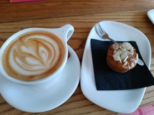 Oat latte and cake (Bakewell maybe?) at Kaph in Dublin