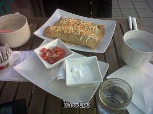 Incredibly delicious vegetable, black bean and rice enchilida. Very filling too. at Chomp Vegan Eatery in Vancouver