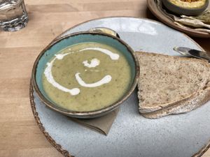 Sopa servida com pão e manteiga vegan!!😋  at Saramago Cafe Bar in Glasgow