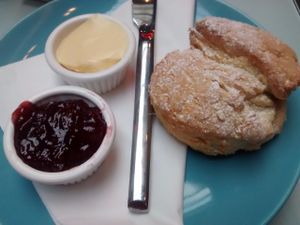 Scone, spread, and jam at Saramago Cafe Bar in Glasgow
