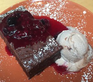 chocolate cake with chocolate ice cream  at Saramago Cafe Bar in Glasgow