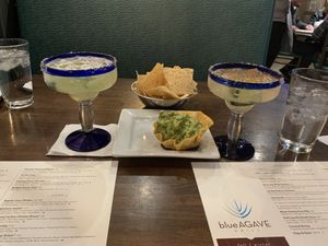 Muy Matcho Margarita (left), happy hour guac (center), and Spicy Cucumber Margarita (right)  at Blue Agave Grill in Fort Collins