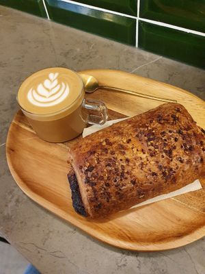 Cortado and pain au chocolat at Nanø Coffee Lab in Mallorca