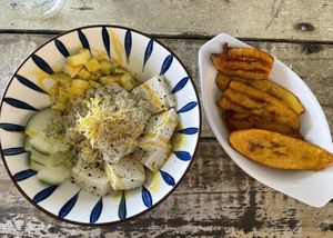 Tofu delight (ask for unbreaded tofu, if vegan) and plantains.   at Playa Forti in Willemstad