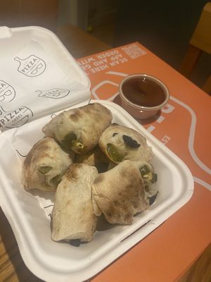 Dough balls with olive and jalapeños   at Pizza Geeks - Haymarket in Edinburgh