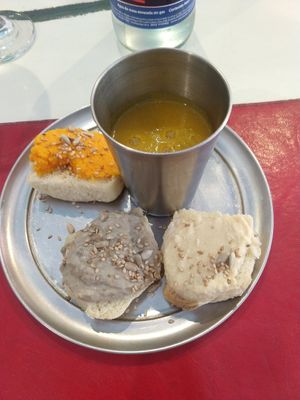 Miniature soup, 3 slices of bread with toppings at Naturaleza Sabia in Buenos Aires