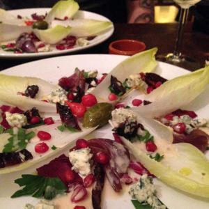 chicory and blue cheese salad with pomegranates and dried plums at Marits Eetkamer in Amsterdam