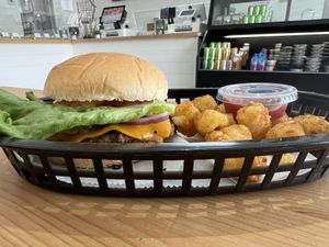 Smash burger with tater tots  at Stephanie's Vegan Bakery + Cafe in Fort Lauderdale