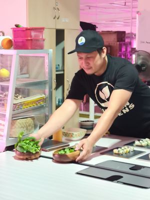 ingredients are harvested fresh from the indoor farm, and prepared for dinner at Urban Greens in Makati