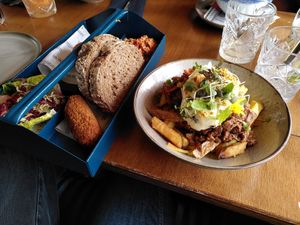 From left: worker's lunch, stew and ice tea at Eetbar De Wagon in Tilburg