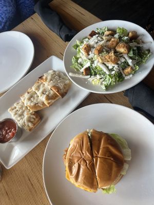 garlic bread, Cesar salad and “chicken” sandwich - tastes like what i remember of mcdonald’s   at Vegan & Vine in Phoenix