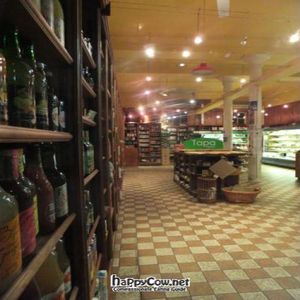 View through the shop window from Great Western Road at Roots  Fruits and Flowers - Great Western in Glasgow