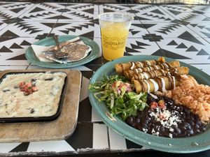 Flautas and queso fundido and a refreshing mango margarita ❤️  at Tacotarian - Blue Diamond Rd in Las Vegas