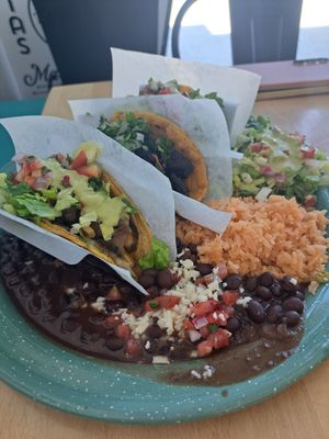3 taco platter, also served with salad, rice and beans. at Tacotarian - Blue Diamond Rd in Las Vegas
