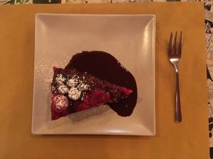 Vegan raspberry cheesecake at Origami in La Spezia