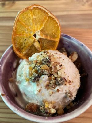Ice cream with nuts and tankan orange. Made with cashews, coconut oil, beanstalk, maple syrup at ne - Plant-based Cafe & Act in Yakushima