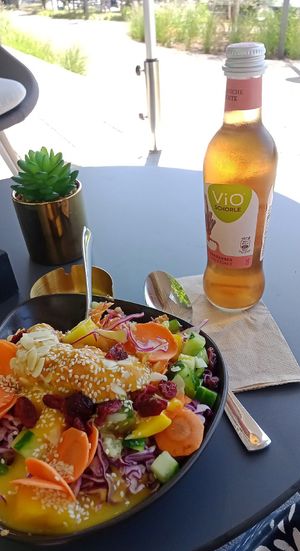 Quinoa Bowl, Rhabarber Schorle at Yuícery Rheingarten in Konstanz