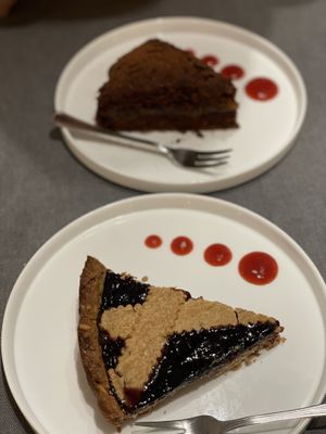 Chocolate cake with apricot jam & a traditional Italian cake with blackberry topping   at Pizzeria Daniela in Montebelluna