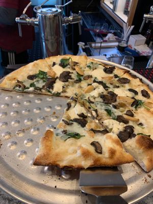 Build your own vegan pizza at Cork N Crust in Bellevue
