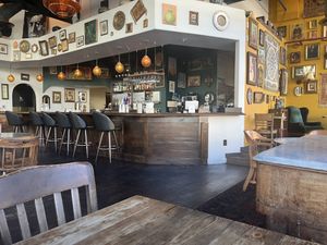   at The Den Cafe in Santa Ana