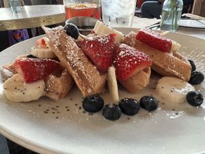   at The Den Cafe in Santa Ana