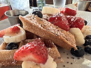   at The Den Cafe in Santa Ana