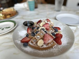   at The Den Cafe in Santa Ana