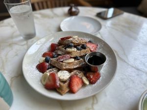   at The Den Cafe in Santa Ana