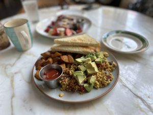   at The Den Cafe in Santa Ana