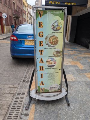 Sidewalk sign at Govindas Las Nieves in Bogota