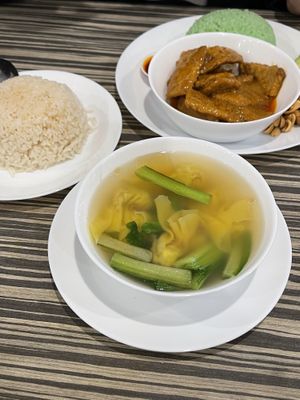 Chicken rice, wonton soup, nasi lemak with pandan rice  at Vege Munch in Northbridge